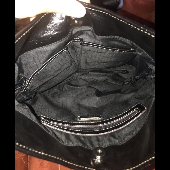 EUC Black Rossetti Bucket Bag. Silver Hardware. Full of zippers and pockets. - Picture 5 of 6